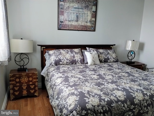 bedroom featuring wood-type flooring