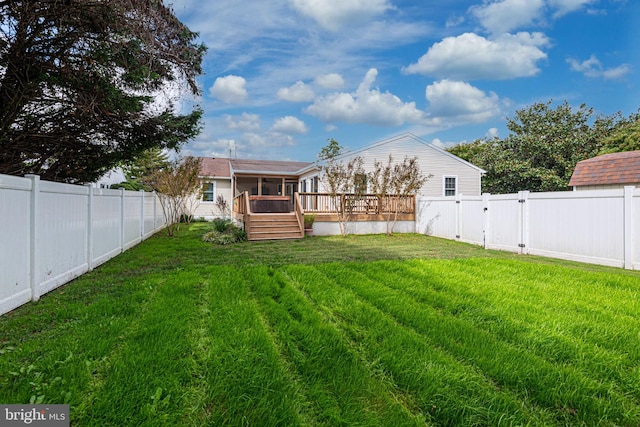 view of yard featuring a wooden deck