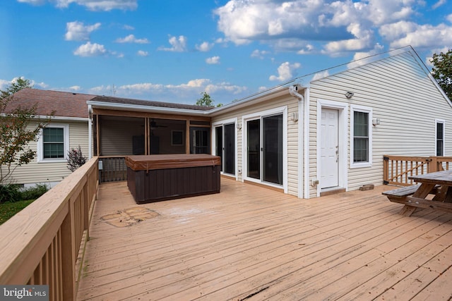 deck featuring a hot tub