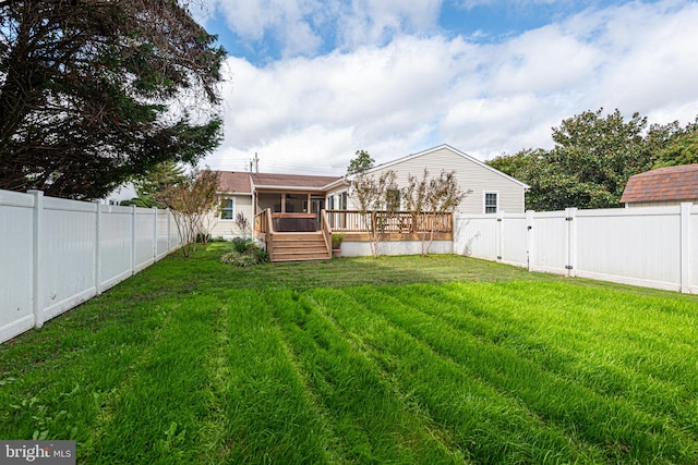 view of yard with a deck