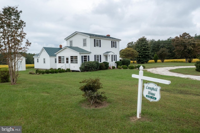 view of front of house with a front yard