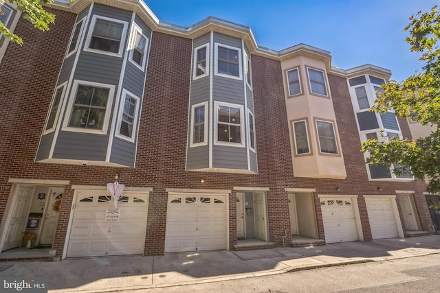 view of front of property featuring a garage