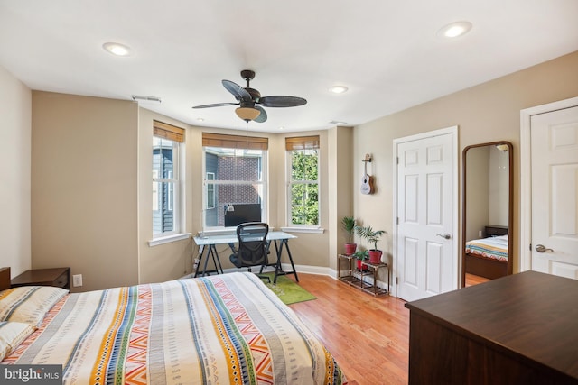 bedroom featuring ceiling fan and light wood-type flooring