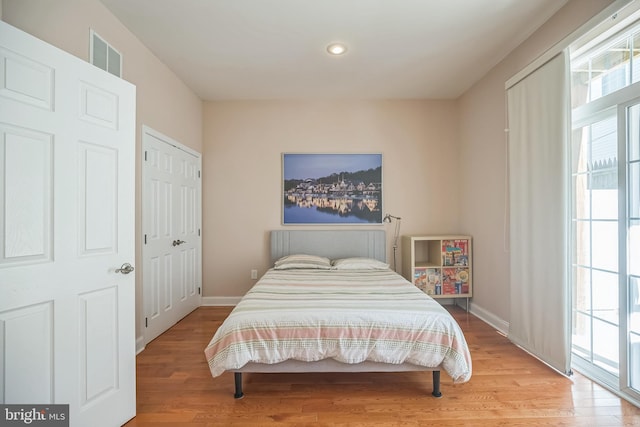 bedroom featuring light hardwood / wood-style flooring