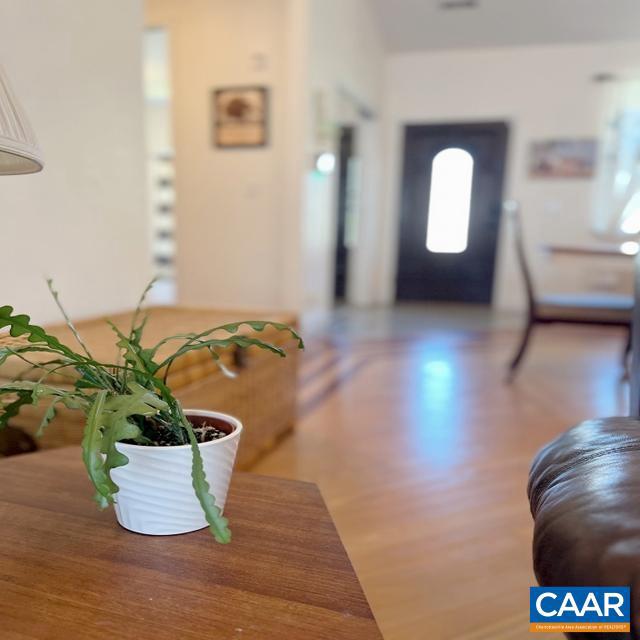 foyer entrance with hardwood / wood-style floors