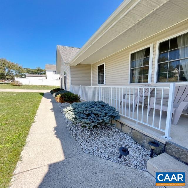 view of side of property featuring a yard