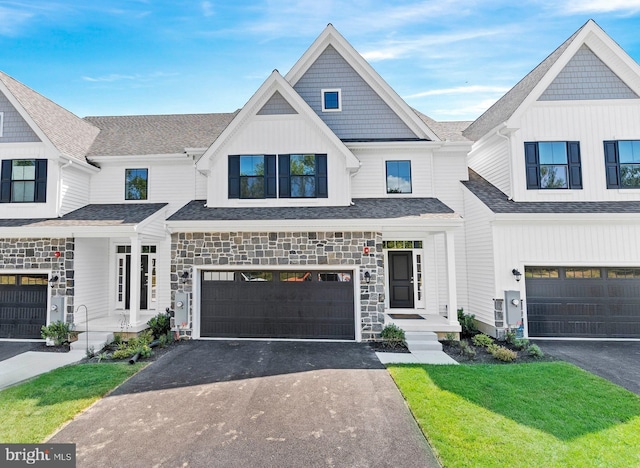 view of front facade with a garage and a front lawn