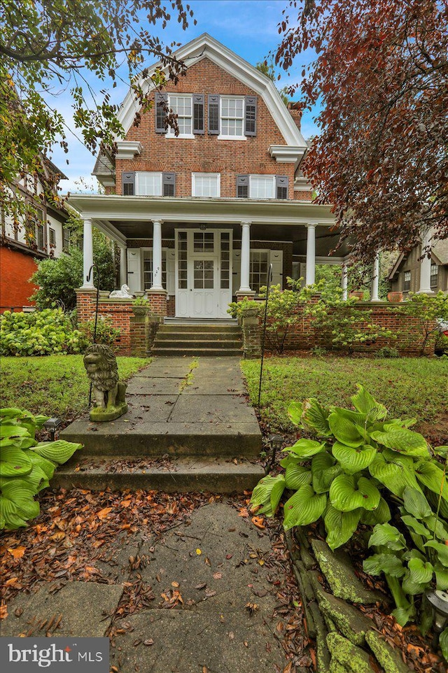 view of front of house with covered porch