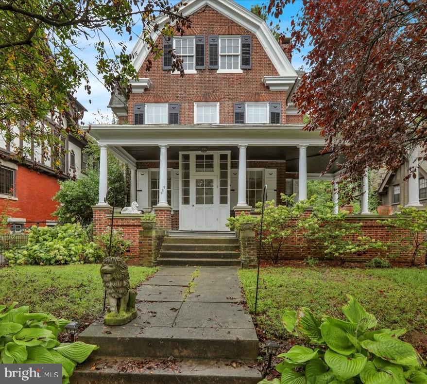 920 Marietta Ave, Lancaster, PA 17603 - view of front facade featuring brick siding and a porch