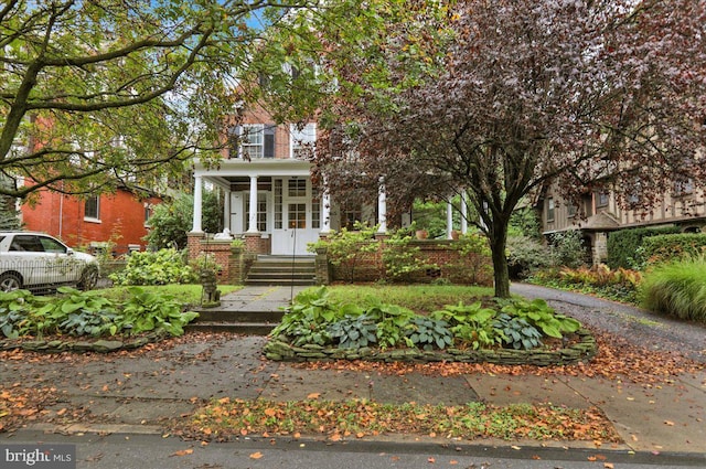 view of front of house featuring covered porch