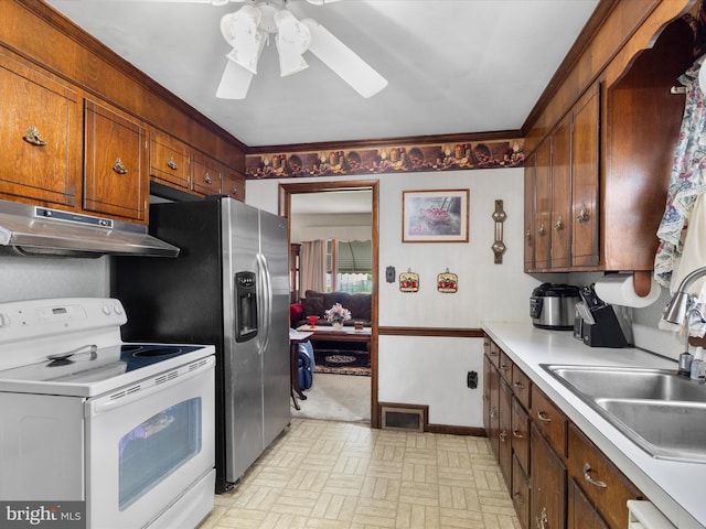 kitchen featuring dishwasher, white electric range, sink, and ceiling fan