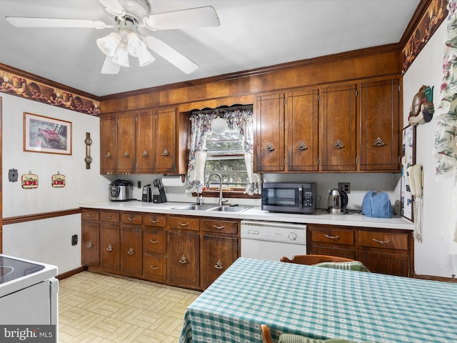 kitchen featuring sink, stove, white dishwasher, ceiling fan, and light parquet floors