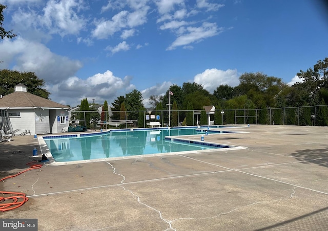 view of pool featuring a patio area