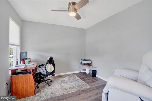 home office featuring ceiling fan and hardwood / wood-style flooring