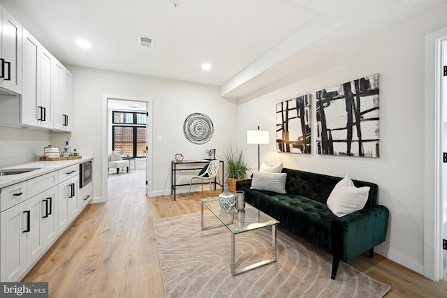 living room with light wood-type flooring