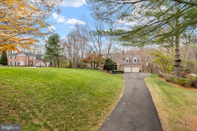 view of yard with a garage