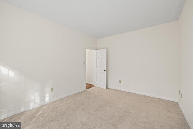 spare room featuring carpet flooring