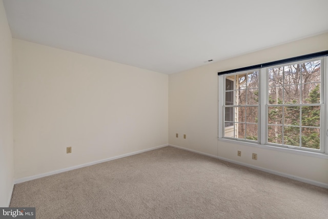 view of carpeted spare room