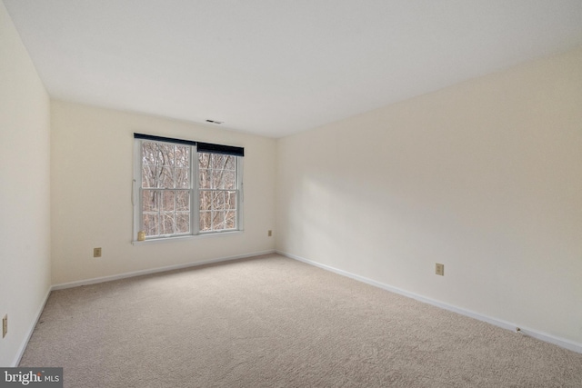 view of carpeted spare room