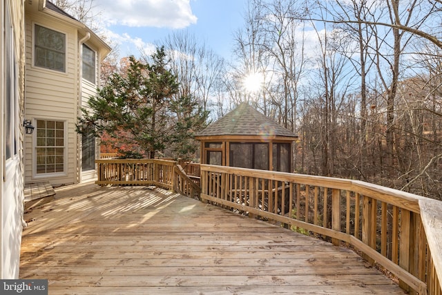 wooden deck with a gazebo