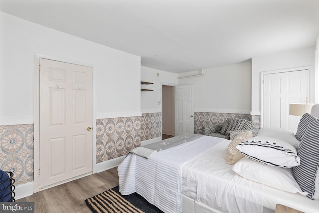 bedroom featuring light hardwood / wood-style flooring