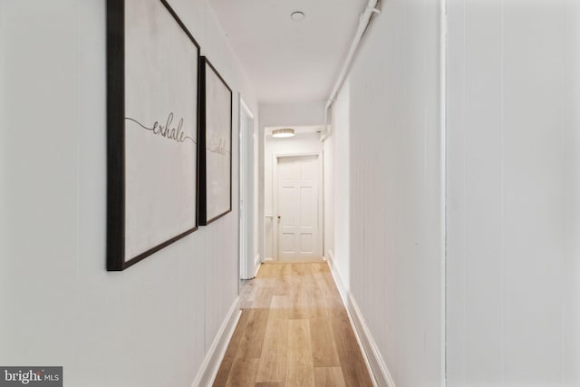 hallway with light wood-type flooring