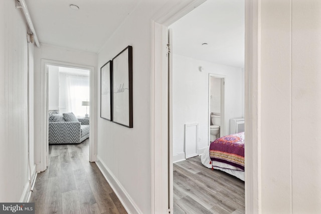 corridor featuring light hardwood / wood-style flooring