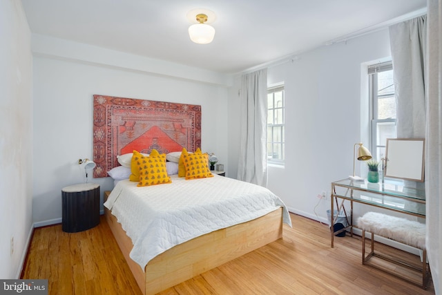 bedroom featuring hardwood / wood-style floors