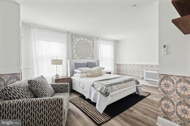 bedroom featuring wood-type flooring