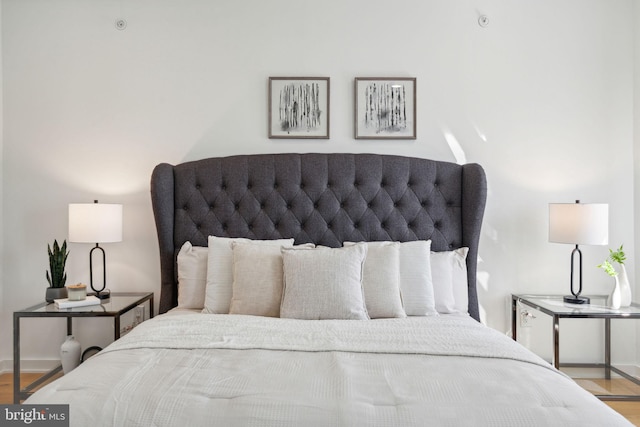 bedroom with light hardwood / wood-style floors