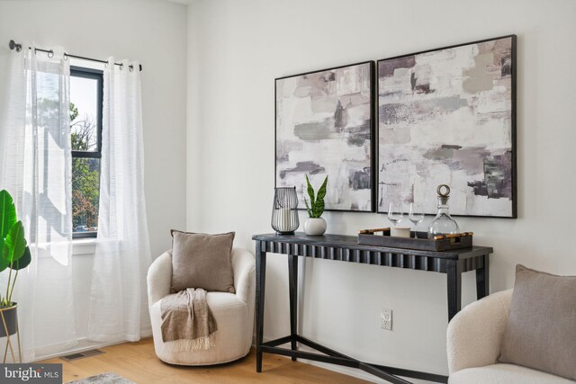 living area featuring hardwood / wood-style flooring