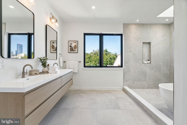 bathroom featuring independent shower and bath and vanity