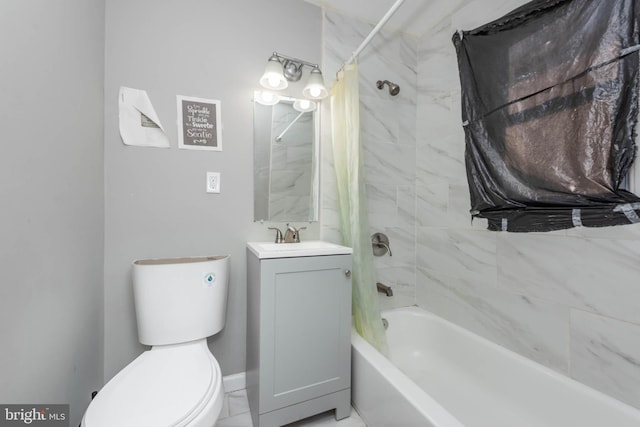 full bathroom with vanity, shower / bath combo with shower curtain, and toilet