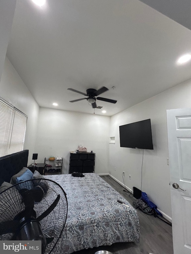 bedroom with recessed lighting, wood finished floors, a ceiling fan, and baseboards