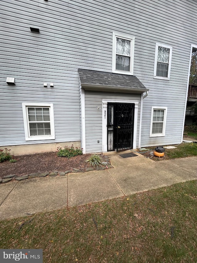 property entrance featuring a garage