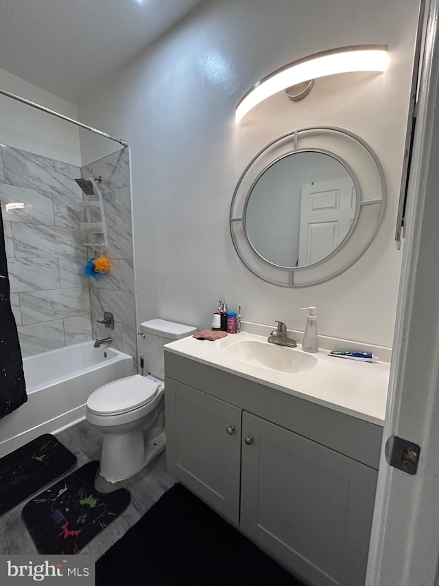 full bathroom featuring shower / tub combo with curtain, vanity, and toilet