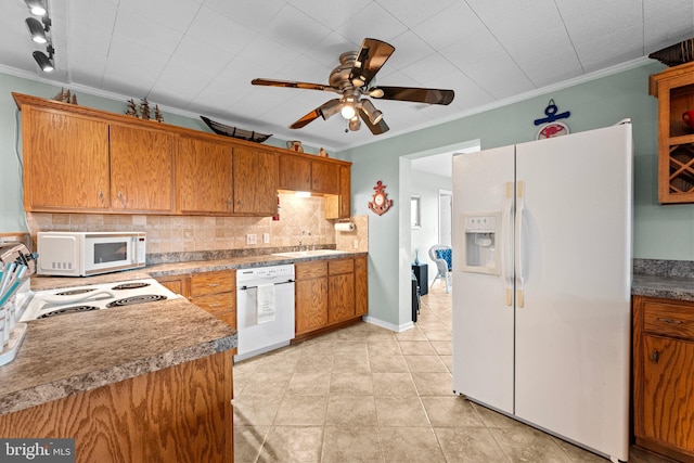 kitchen with ceiling fan, light tile patterned flooring, ornamental molding, and white appliances