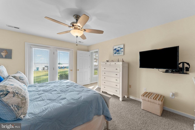 bedroom with ceiling fan, light colored carpet, and access to outside