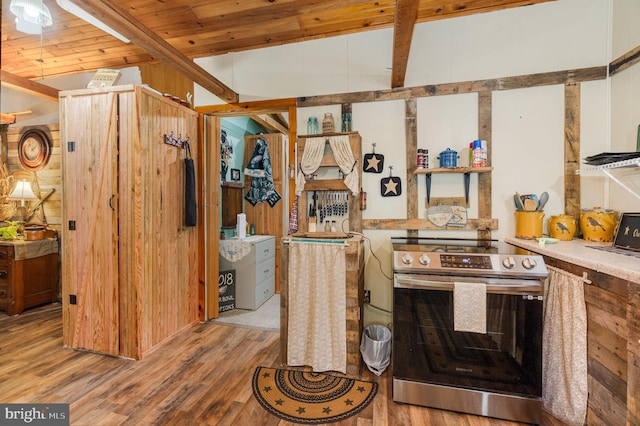 kitchen with electric stove, vaulted ceiling with beams, wood ceiling, and light wood-type flooring