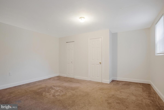 spare room with carpet