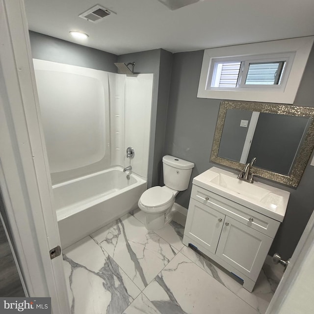 full bathroom with vanity, bathtub / shower combination, and toilet