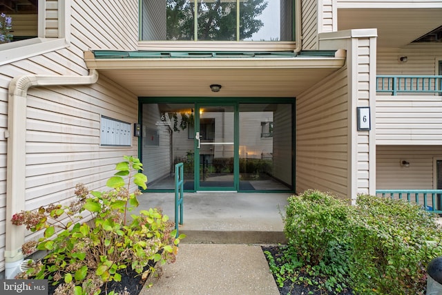 property entrance with a patio