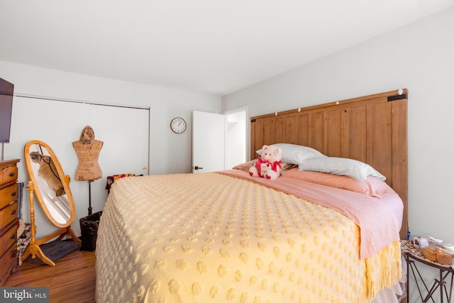 bedroom featuring hardwood / wood-style floors