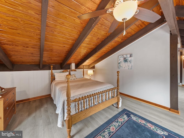 bedroom with ceiling fan, vaulted ceiling with beams, light wood-type flooring, and wood ceiling