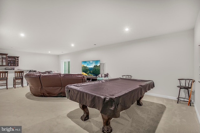 recreation room with light colored carpet and billiards