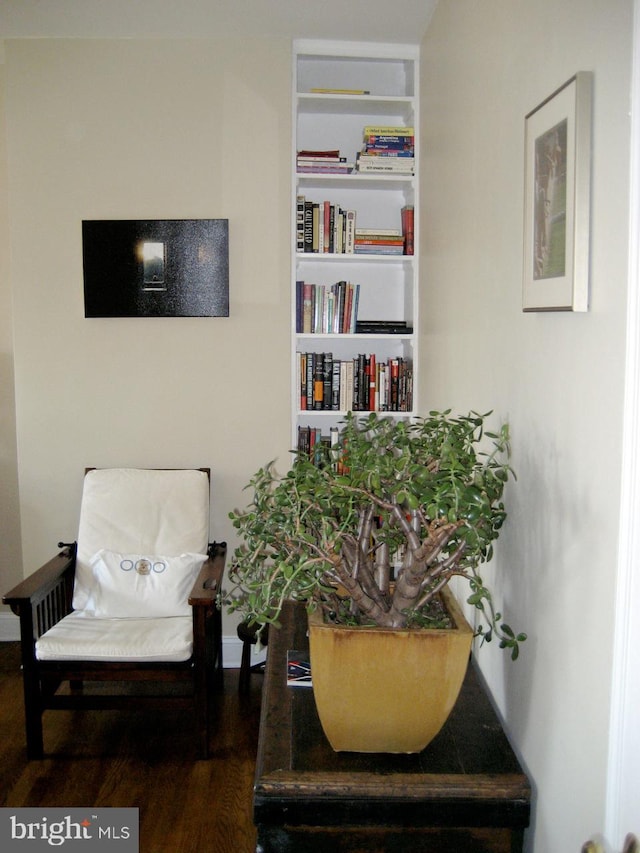 sitting room featuring hardwood / wood-style flooring