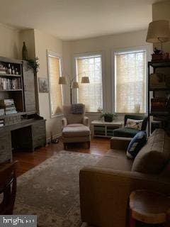 sitting room featuring hardwood / wood-style flooring