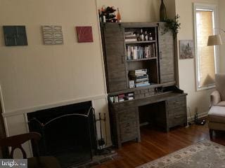 sitting room featuring hardwood / wood-style floors