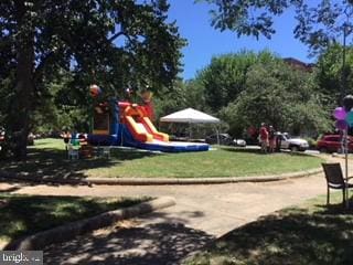 view of play area with a yard