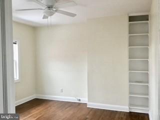 651 Constitution Ave NE, Washington, DC 20002 - empty room with baseboards, wood finished floors, and a ceiling fan